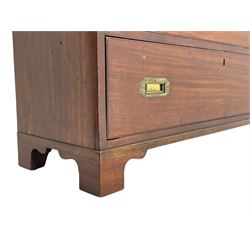 Georgian military type campaign chest, narrow rectangular top over three short and three long drawers, recessed brass handles, on bracket feet