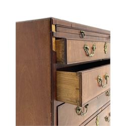 George III mahogany chest, banded caddy top with moulded edge, brushing slide over four graduating cock-beaded drawers, ornate cast gilt metal handle plates and escutcheons, swan neck handles cast with dolphins, shells and C-scrolls, lower moulding over bracket feet