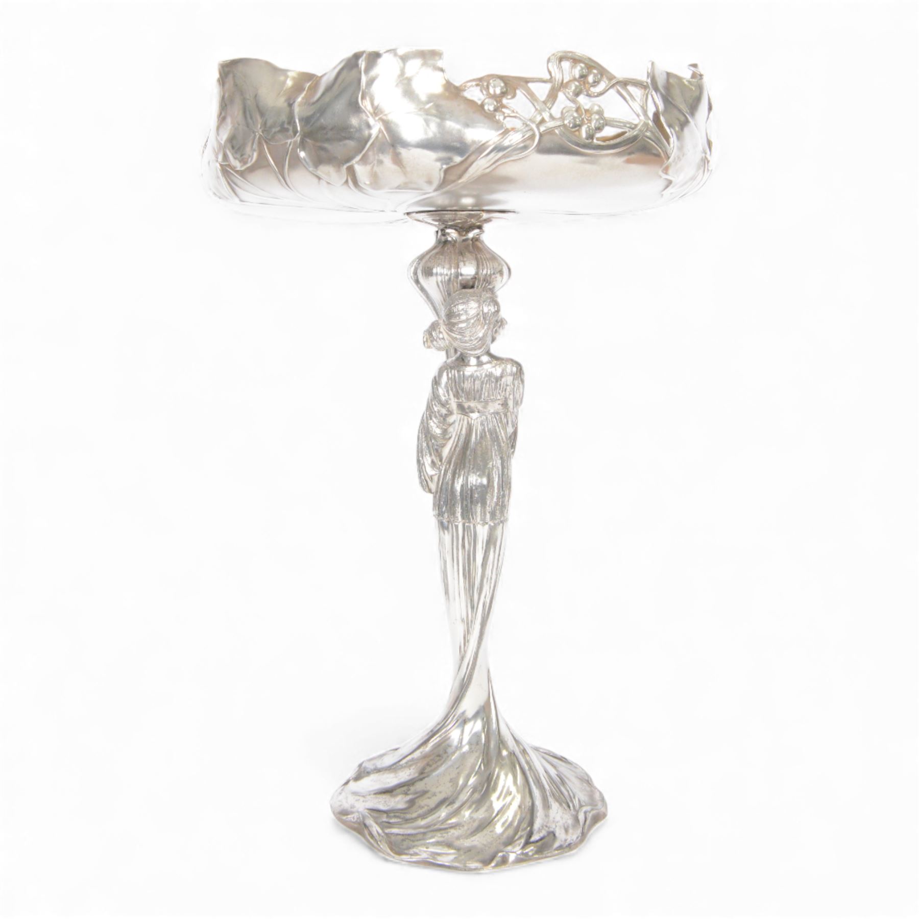 WMF figural centre piece the pedestal in the form of a woman, holding flower bud, the bowl decorate with vine leaves and berries, mark stamped to base, H38cm