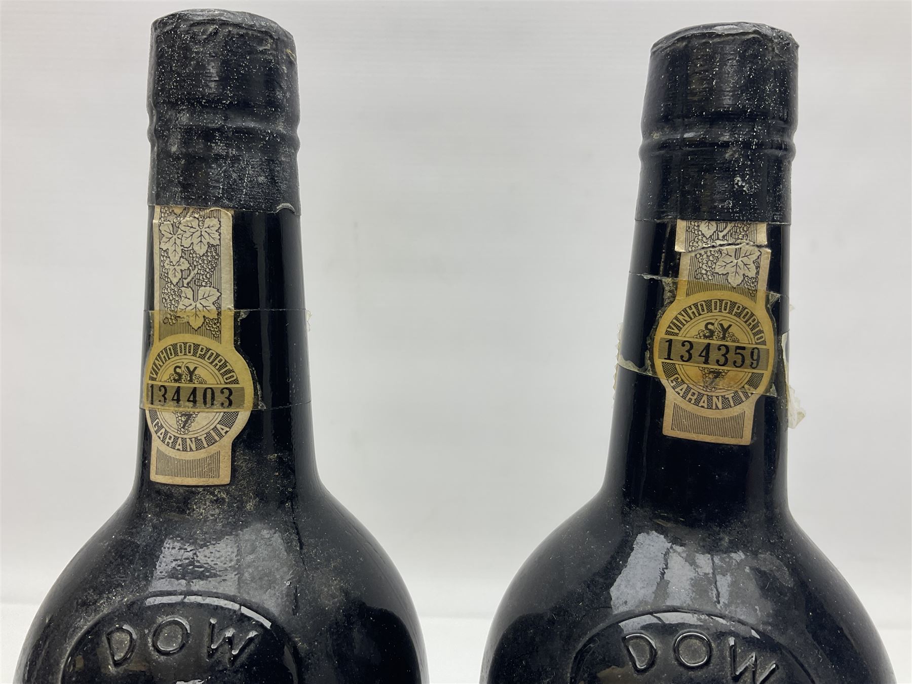 Dow's 1966 vintage port, two bottles, unknown contents and proof 