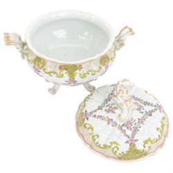 19th Century French faience tureen and cover, decorated with floral swag and net detail with gilt scrollwork handles, raised on four scroll feet, H20cm