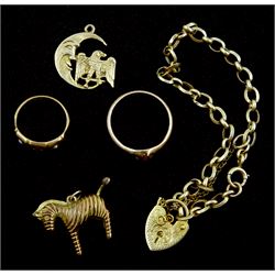 Victorian 15ct gold three stone ruby and split pearl ring, 9ct gold link bracelet,  two charms including zebra and moon and an 8ct gold gold stone set ring