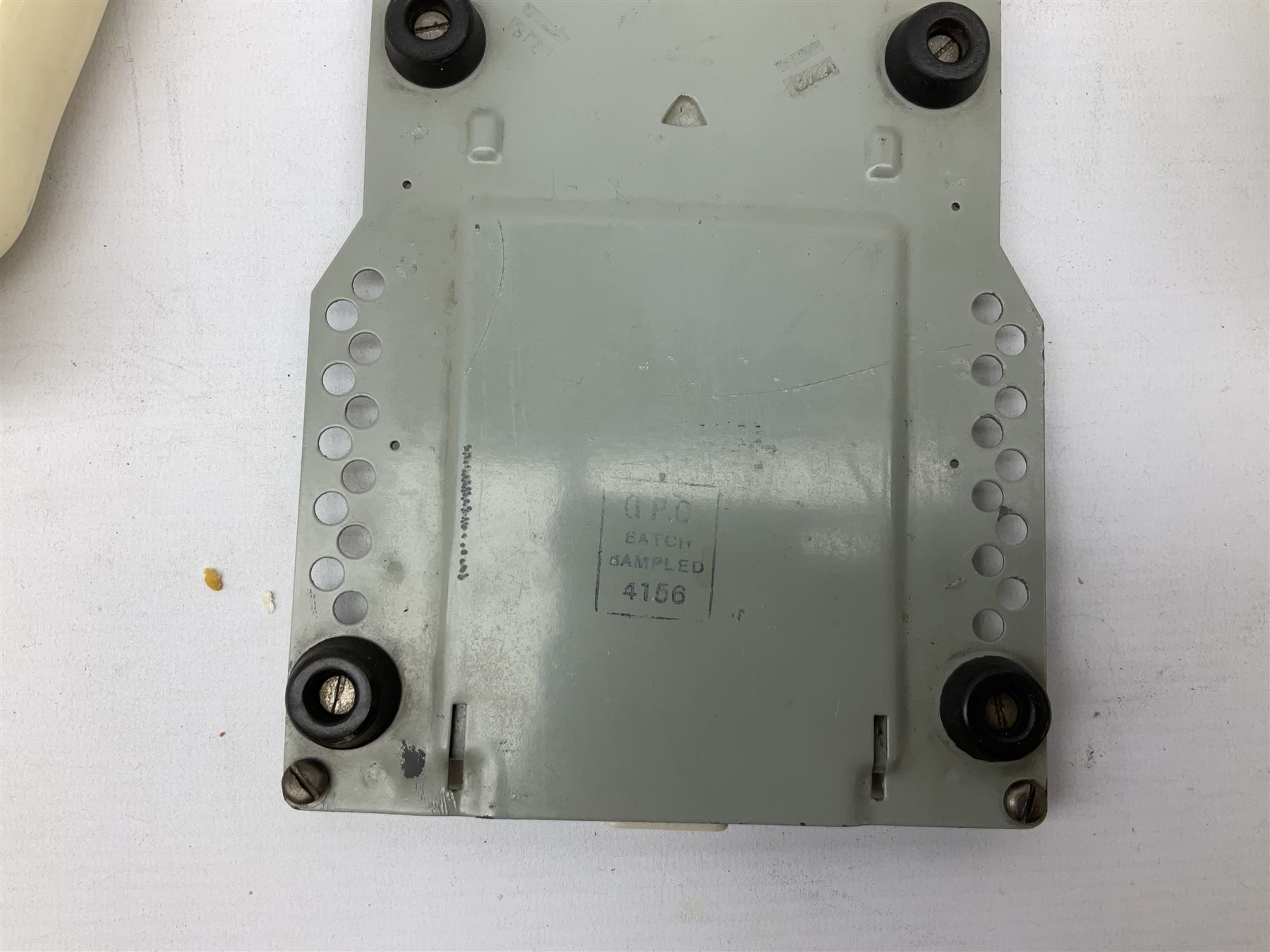 White Bakelite telephone, with alphabet dial, brown braided handset