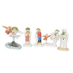 Five Coalport The Snowman figures, comprising Adding a Smile, Walking in the Air, Snowman'...