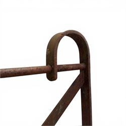 Georgian wrought iron strapwork gate, with arched cresting rail ends and hinged latch