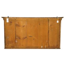 Regency period gilt and gesso framed tripartite overmantel mirror, projecting cavetto cornice applied with globular mounts, the frieze carved with repeating scallop and floral urn motifs, flanked by canted cluster-column pilasters with acanthi capitals, the triple rectangular bevelled plates within reeded slips, on skirted ebonised base
