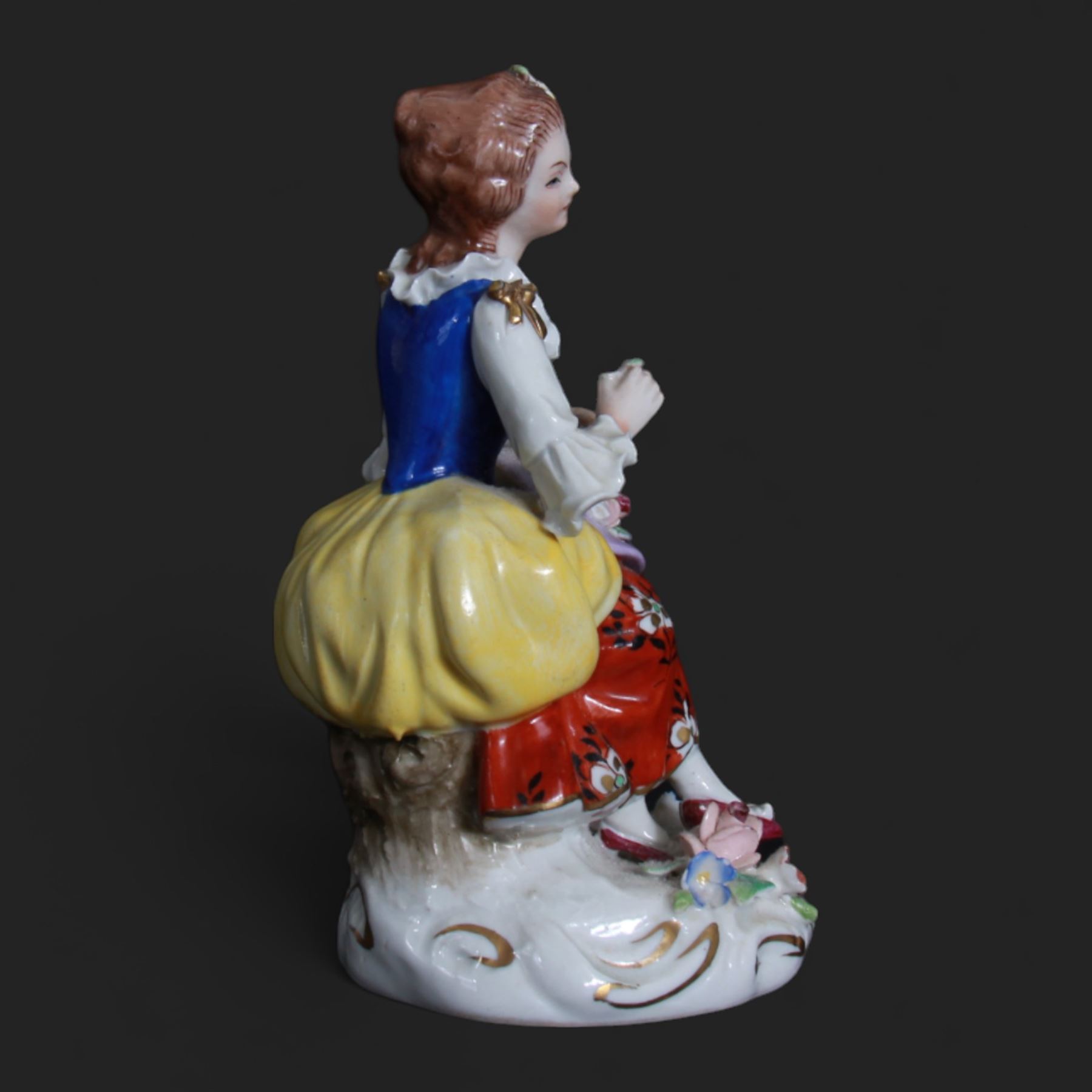 Two Volkstedt figures, comprising Piper and Harlequin, together with three Sitzendorf figures, largest H20cm 