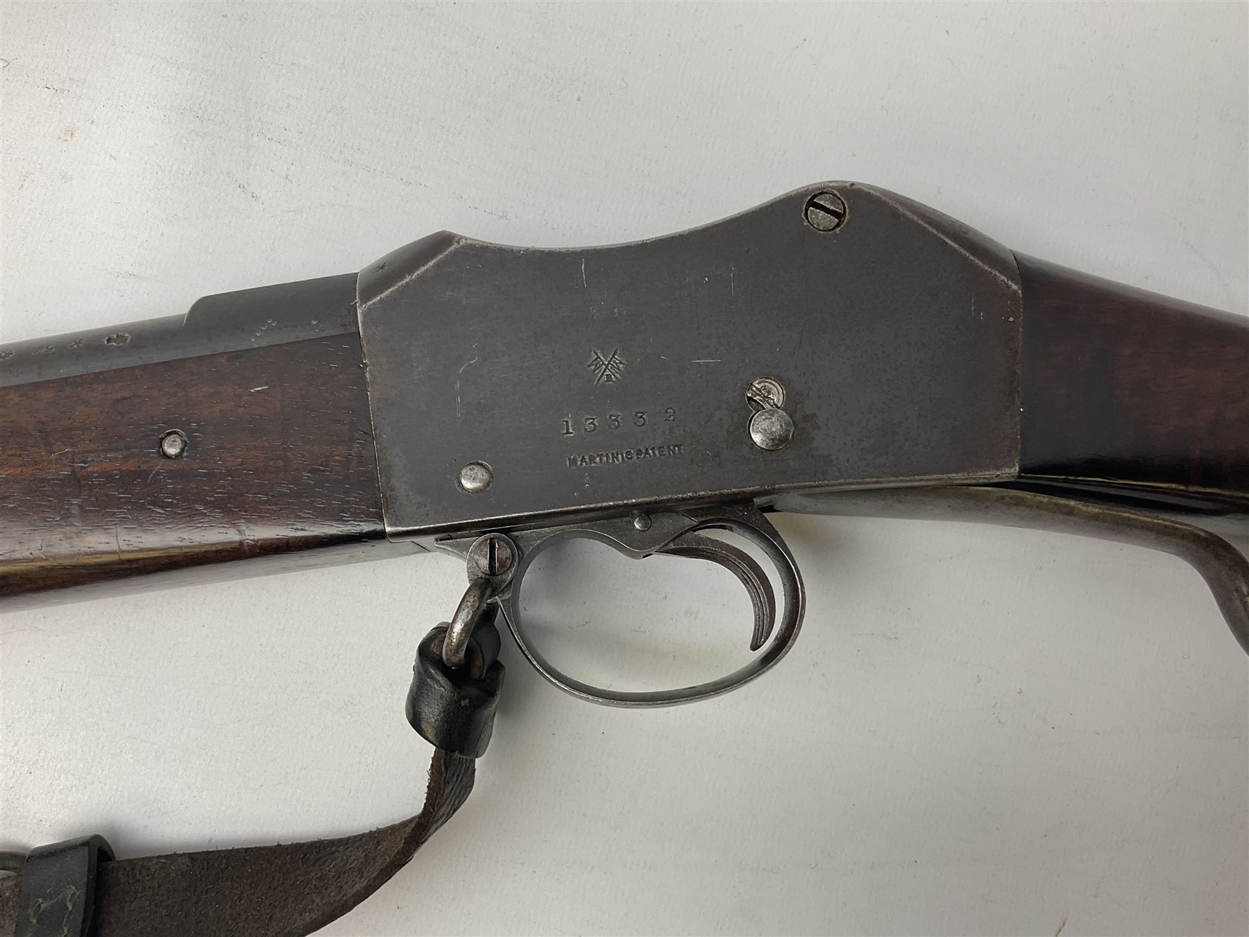 Braendlin Armoury Martini action .577/450 falling back rifle, the 85cm rifled barrel stamped Alex. Henry Edinburgh & London with two barrel bands including Yatagan bayonet side fitting and clearing rod under, with leather sling, serial no.13332, L126cm (NB. Firing pin broken). 