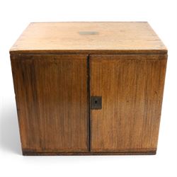 Ealy 20th century oak canteen, with five drawers behind double doors, four drawers contain...