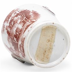 Early 19th century cream pail and cover printed in terracotta with figures sitting in a garden taking tea and with faux loop handles, with old label to the base 'Shorthose & Co. Staffordshire' H9cm
