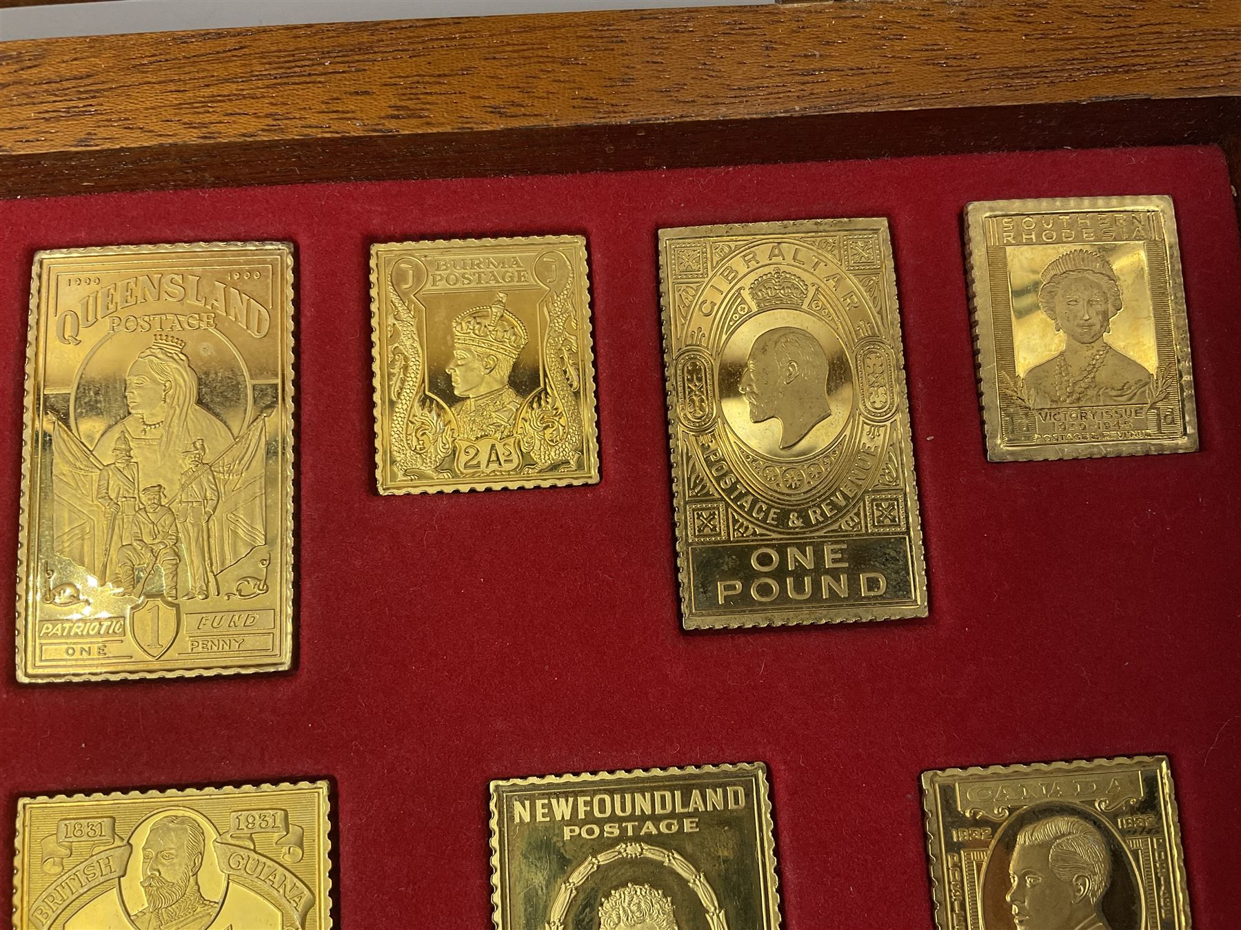 Danbury Mint sterling silver hallmarked stamp ingot set of twenty-five, housed in a fitted wooden case