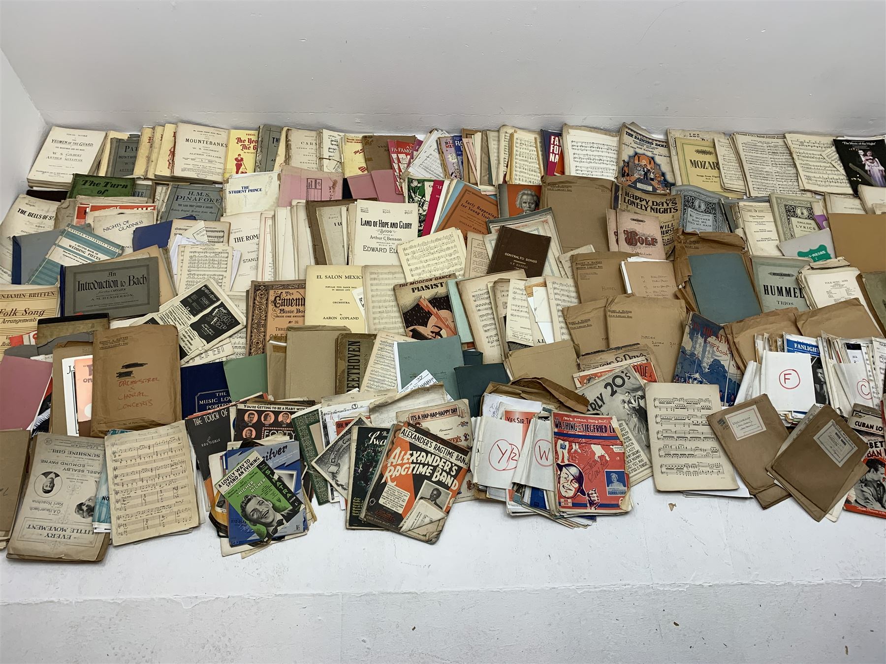 Steinway & Sons - late 19th century figured walnut upright piano, iron framed and overstrung, model no. 56174 circa. 1886, W154cm, H137cm, D70cm, together with a quantity of sheet music