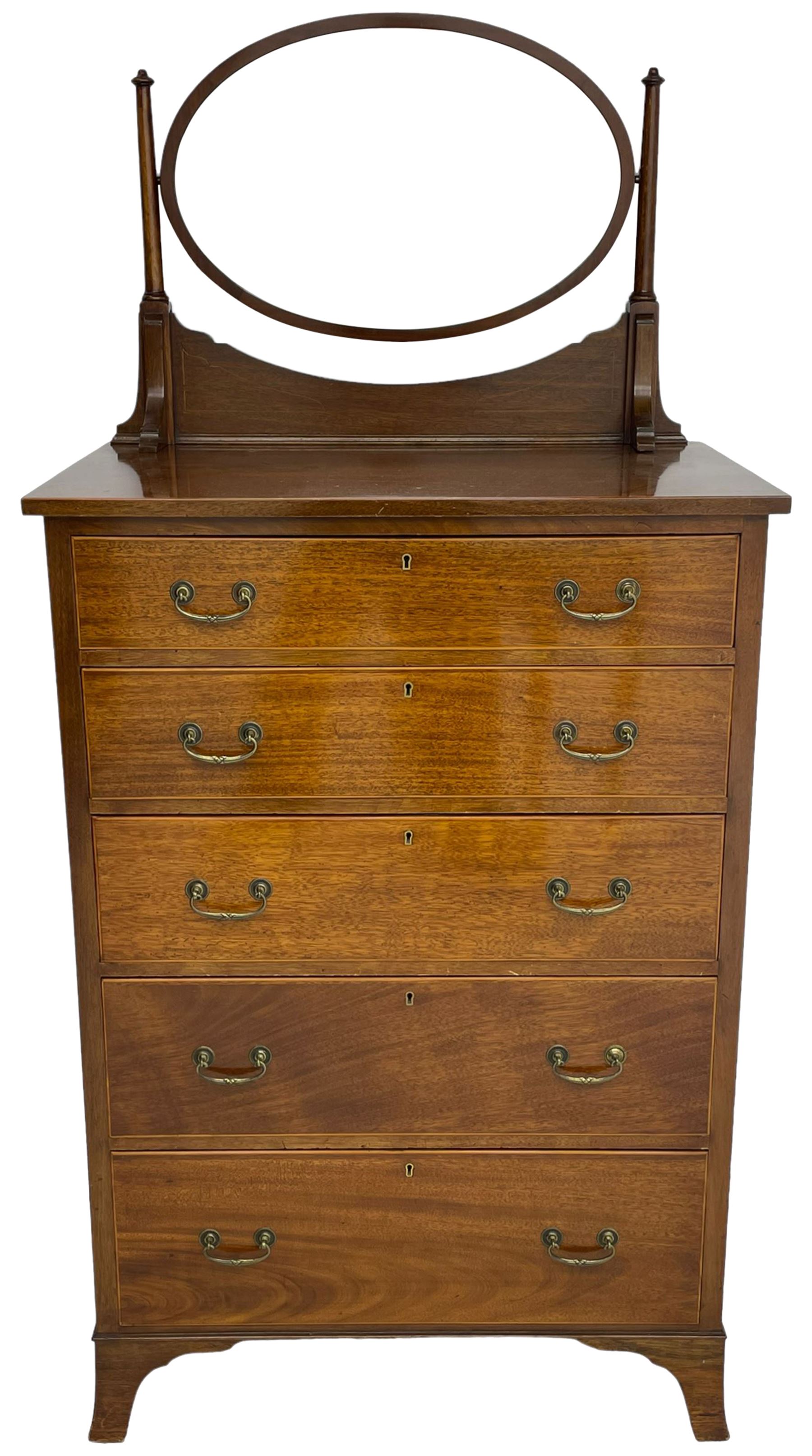 George III design mahogany straight-front chest, raised oval swing mirror with bevelled glass on turned supports, fitted with five graduating drawers with boxwood stringing, on bracket feet