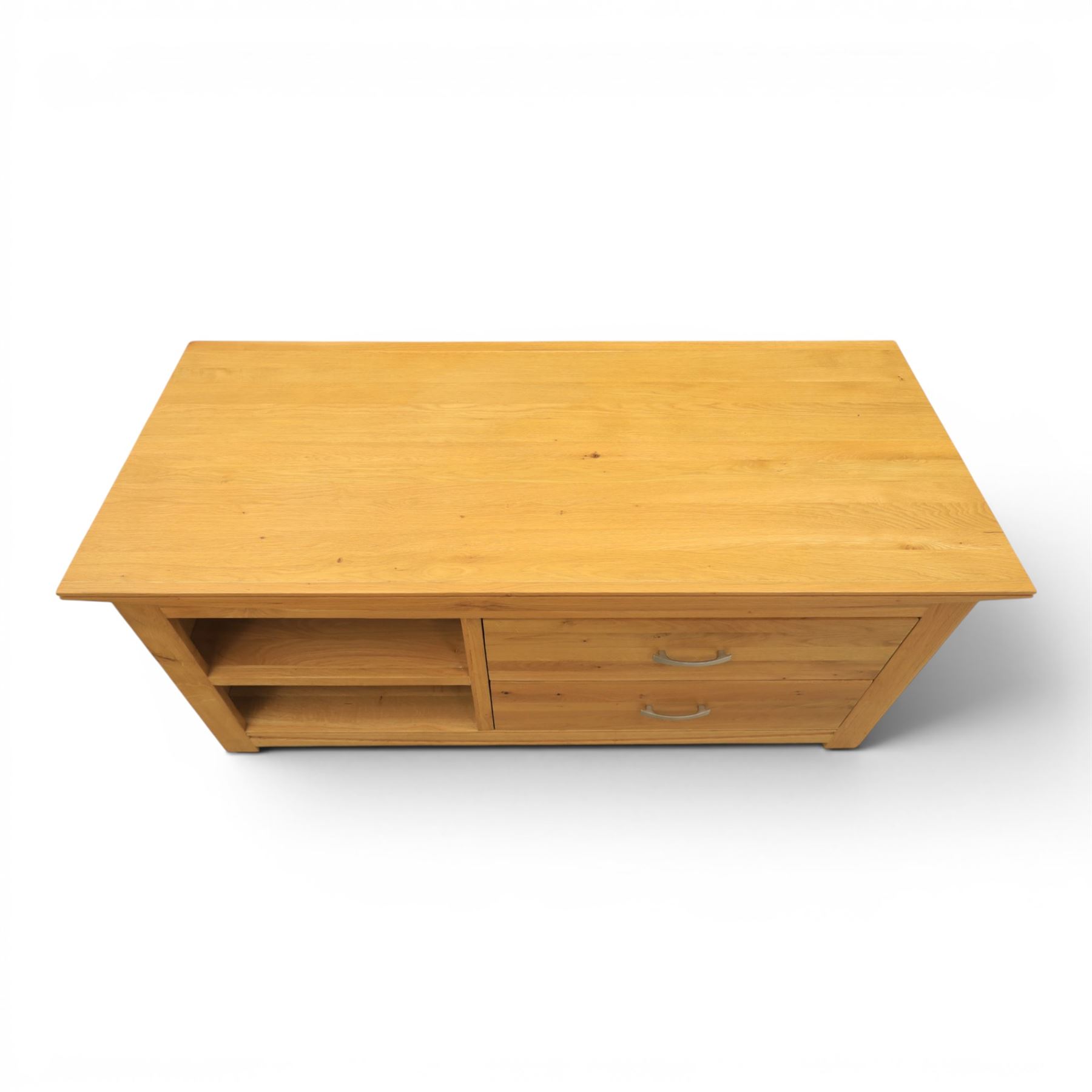 Contemporary light oak television or media unit, two drawers and two open shelves, with apertures for wires