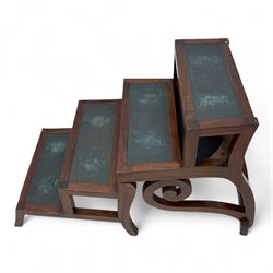 In the manner of Morgan & Sanders - early 20th century Regency design mahogany metaphoric library chair and steps, rectangular panelled top-rail with applied roundels with scrolling arms and upholstered seat and cushion, hinged and folding design transforming into four carpeted steps

Reference: The present lot is based on a design for a metamorphic library chair published by Morgan & Saunders circa 1810, P.Agius, Ackermann's Regency Furniture & Interiors, plate 29, page 60