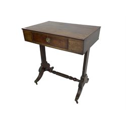 19th century mahogany side table, rectangular top fitted with single drawer, on tapered end supports joined by rope twist stretcher, on acanthus carved splayed supports with brass cups and castors