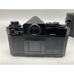 Canon F1n camera body, serial no. 572972, with 'Canon FD 50mm 1:1.4' lens, serial no. 246665, with leather case 