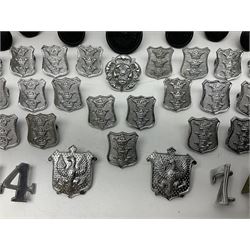 Police - large quantity of cap and collar badges, collar numbers and buttons for Hull City Police, Humberside Police, Lincolnshire Constabulary, York & North East Yorks Police etc; all queen's crown; and three helmet plates including one king's crown