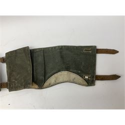 WW2 German - leather combat 'Y'-straps with numbered adjustment holes; M35 leather map case stamped Otto Breitschuh; and pair of army/'SS' gaiters (4)