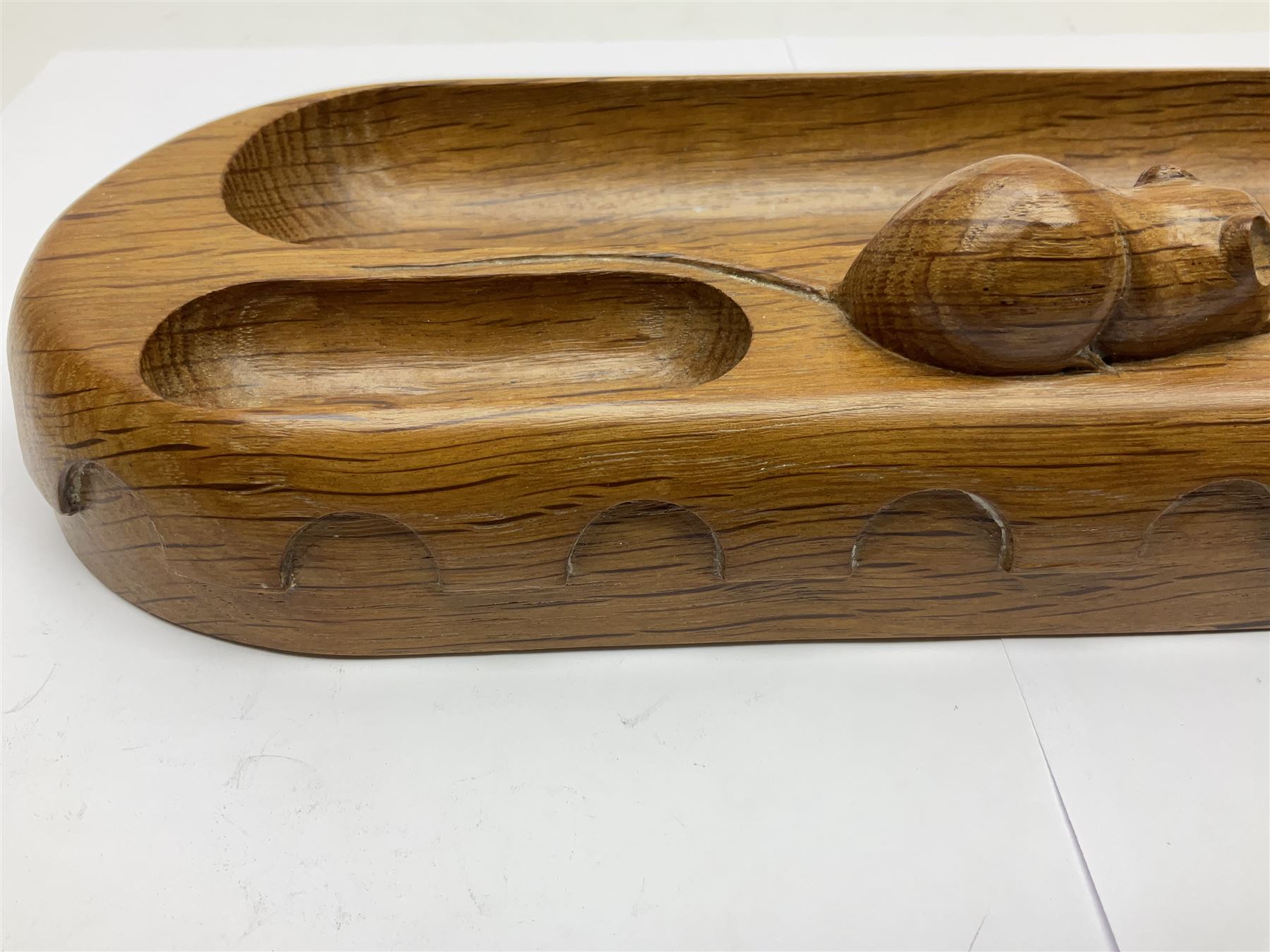 Mouseman - oak pen tray, rectangular form with rounded ends, carved mouse signature over penny moulded edge, by the workshop of Robert Thompson, Kilburn
