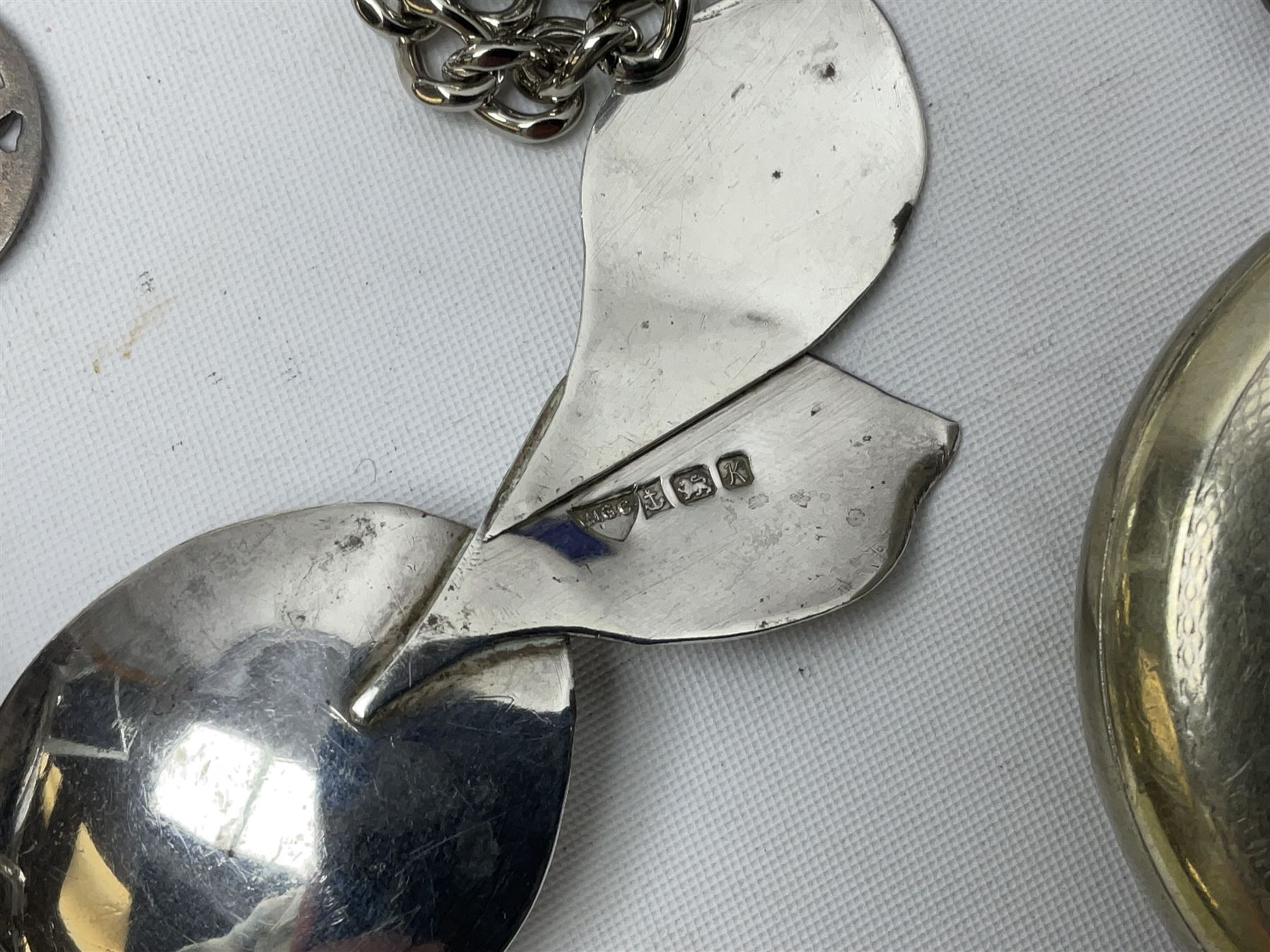 Pair of Georgian silver dress buttons, silver caddy spoon, silver fob medals, silver watches, set of six silver plated teaspoons, set of gilt buttons with ship design, etc