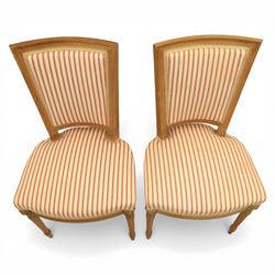 20th century Louis XVI style beech salon suite, comprising settee and four chairs, the settee with shaped rectangular back and upholstered arms over a shaped seat, the chairs with rectangular backs and overstuffed seats, each upholstered in striped fabric with close-nailed borders, upon fluted tapering supports headed by carved paterae, terminating in toupie feet, chairs H89cm W47cm