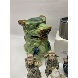 Set of three graduating foo dogs, together with a collection of Swarovski Crystal figure and other collectables 