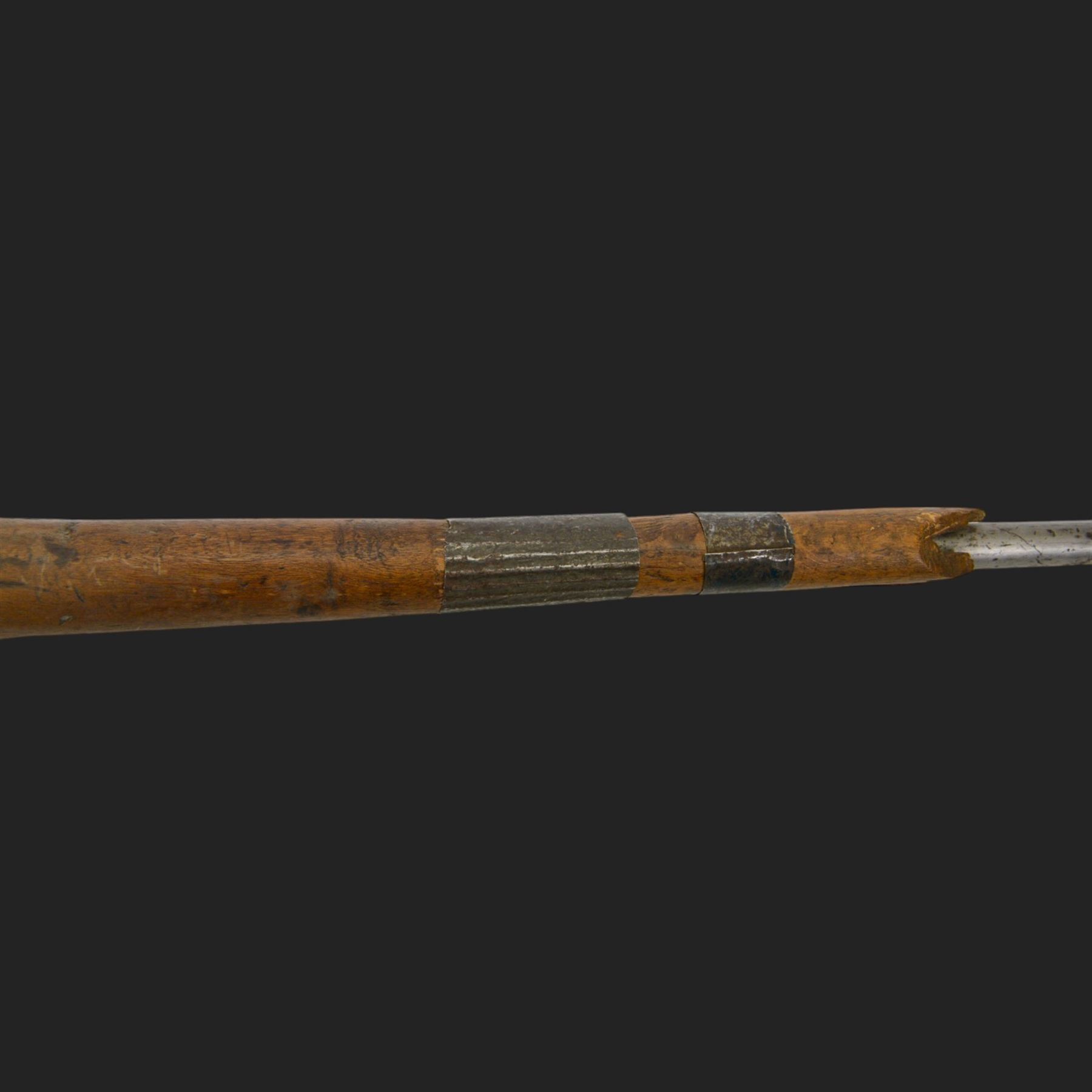 Middle Eastern percussion cap rifle, the 107cm  barrel with four brass bands and ramrod under, overall L143cm, together with another percussion rifle the 106cm barrel a copy of a 17th century Spanish barrel, complete with fake stamp, by vendors repute this rifle was confiscated from tribesmen in Kurdistan by police
Sold as an exempt item under Section 58 (2) of the 1968 Firearms Act, to be held as a curiosity or ornament