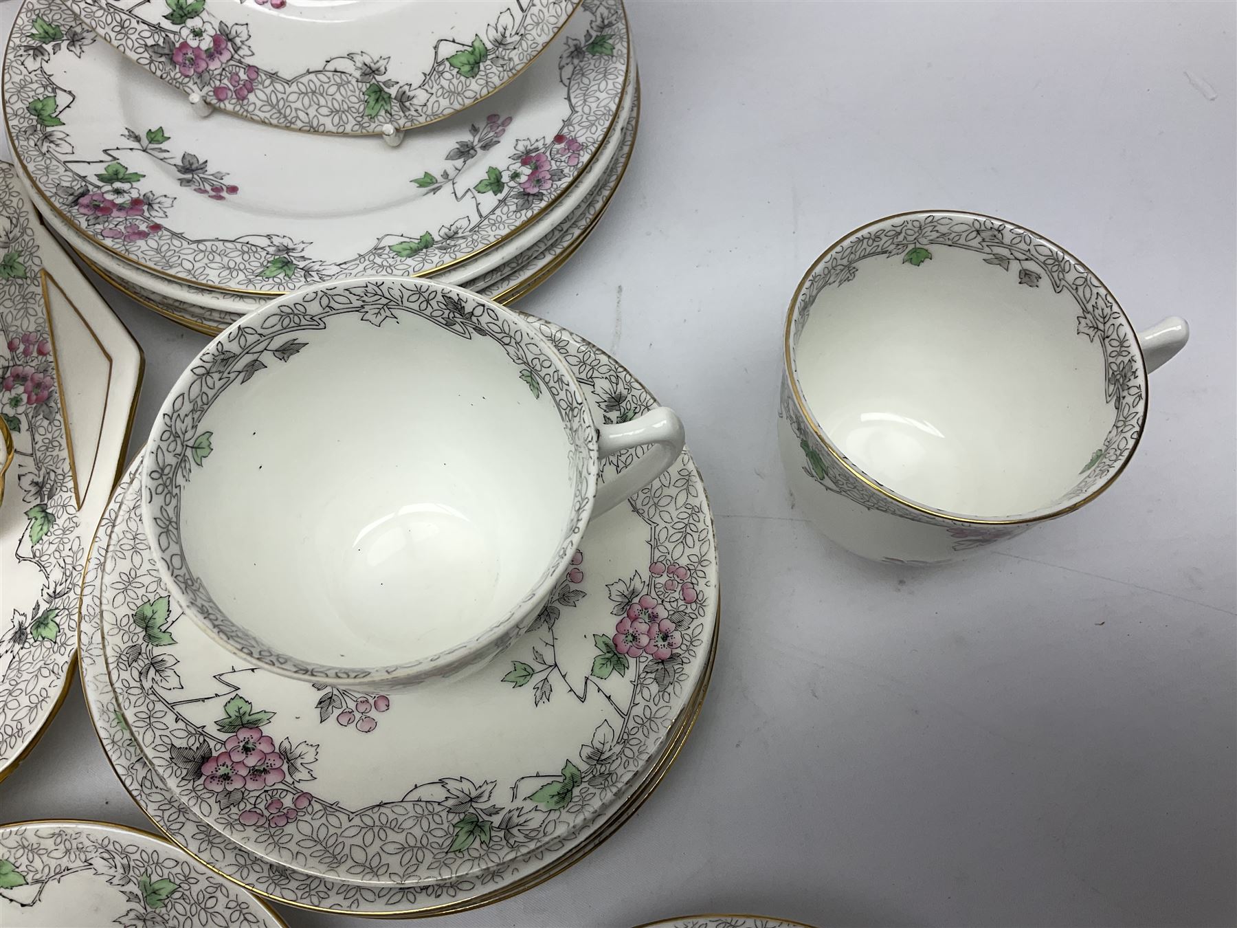 Shelley Bramble Rose pattern tea service, comprising milk jug, open sucrier, ten cups and twelve saucers, twelve dessert plates and two cake plates (38)