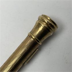 9ct gold 'Lifelong' propelling pencil, with engine turned decoration, stamped 9ct 