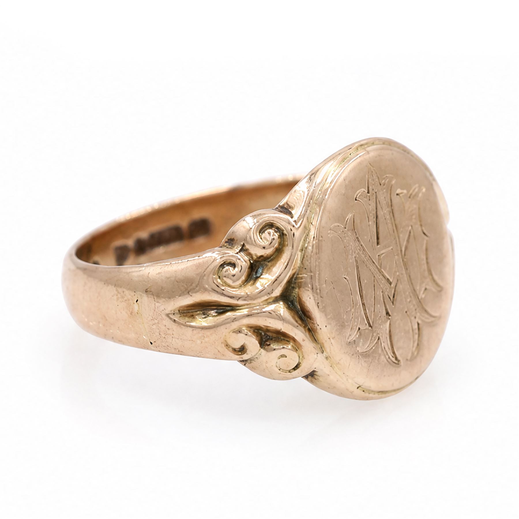 9ct rose gold signet ring, monogrammed with initials 'MA', with scroll design shoulders, Chester 1915
