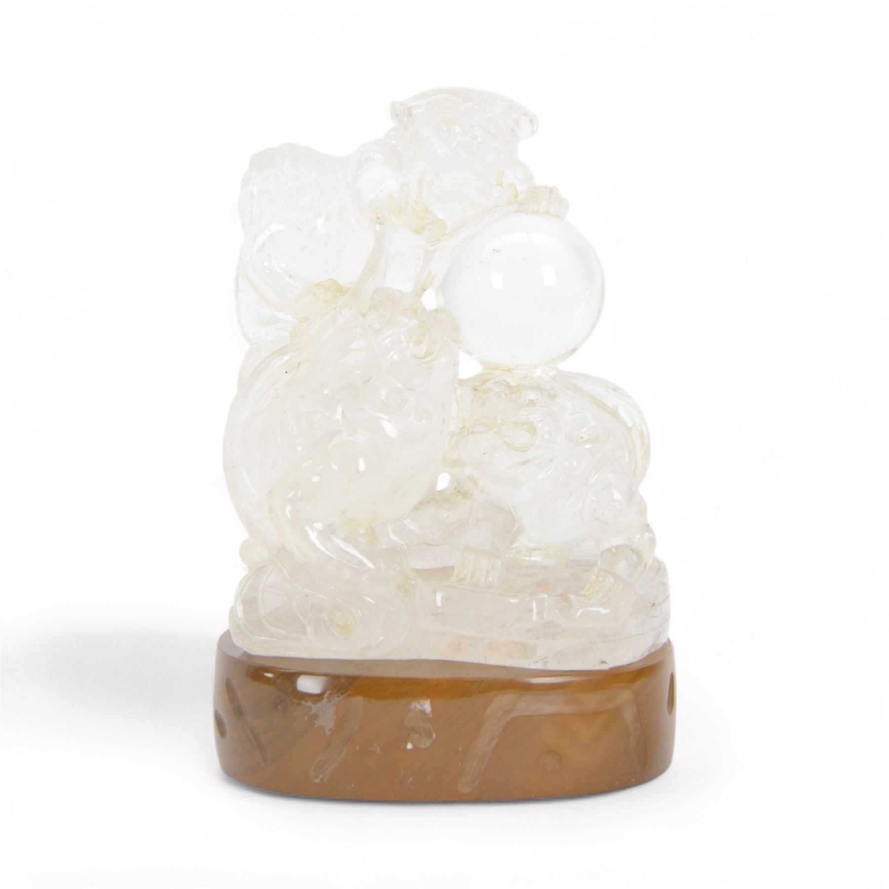 Chinses quartz carved figure group, modelled as three temple lions around a ball, upon an oval base, H20cm