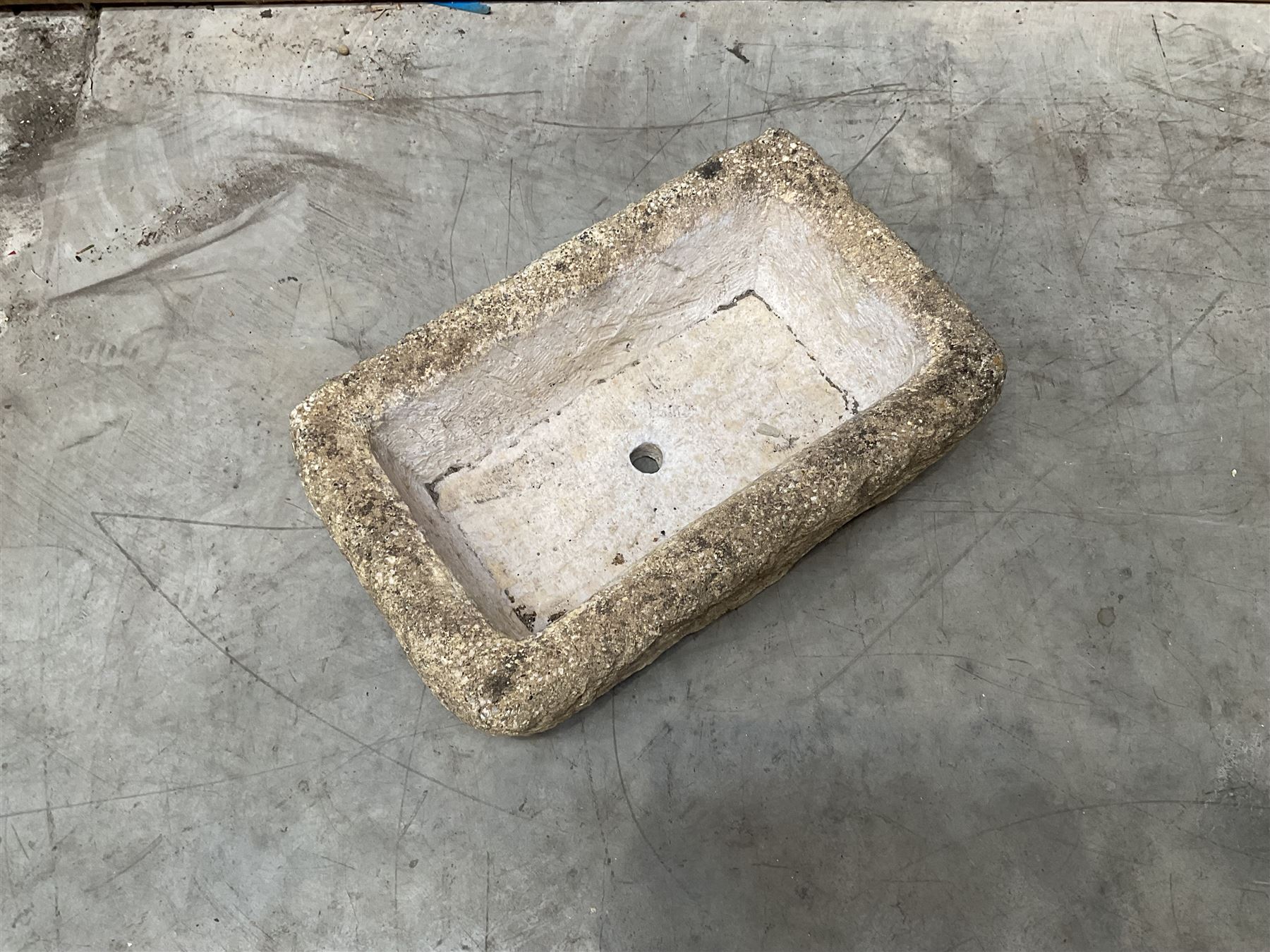 Collection of 9 decorative stone garden objects including sun dial small troughs mill stone and more,