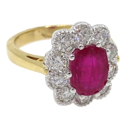 18ct gold oval ruby and round brilliant cut diamond cluster ring, ruby 2.50 carat, total diamond weight 1.50 carat   