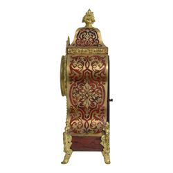 Louis XV-style gilt-bronze mounted turtleshell boulle mantel clock, the case of typical waisted form, gilt bronze foliate scroll and rocaille mounts, raised on scroll feet. Eight-day Paris movement signed “Rollin à Paris”, with outside count-wheel striking half-hourly on a single bell, the going train with anchor escapement. The circular foliate gilt bronze dial with enamelled Roman hour numerals and twin winding apertures, fitted with pierced blue steel hands and bevelled glass cover, with pendulum and key, circa 1860