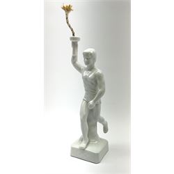 Ceramic Berlin Olympics white glazed figure of a torch bearer, H24.5cm