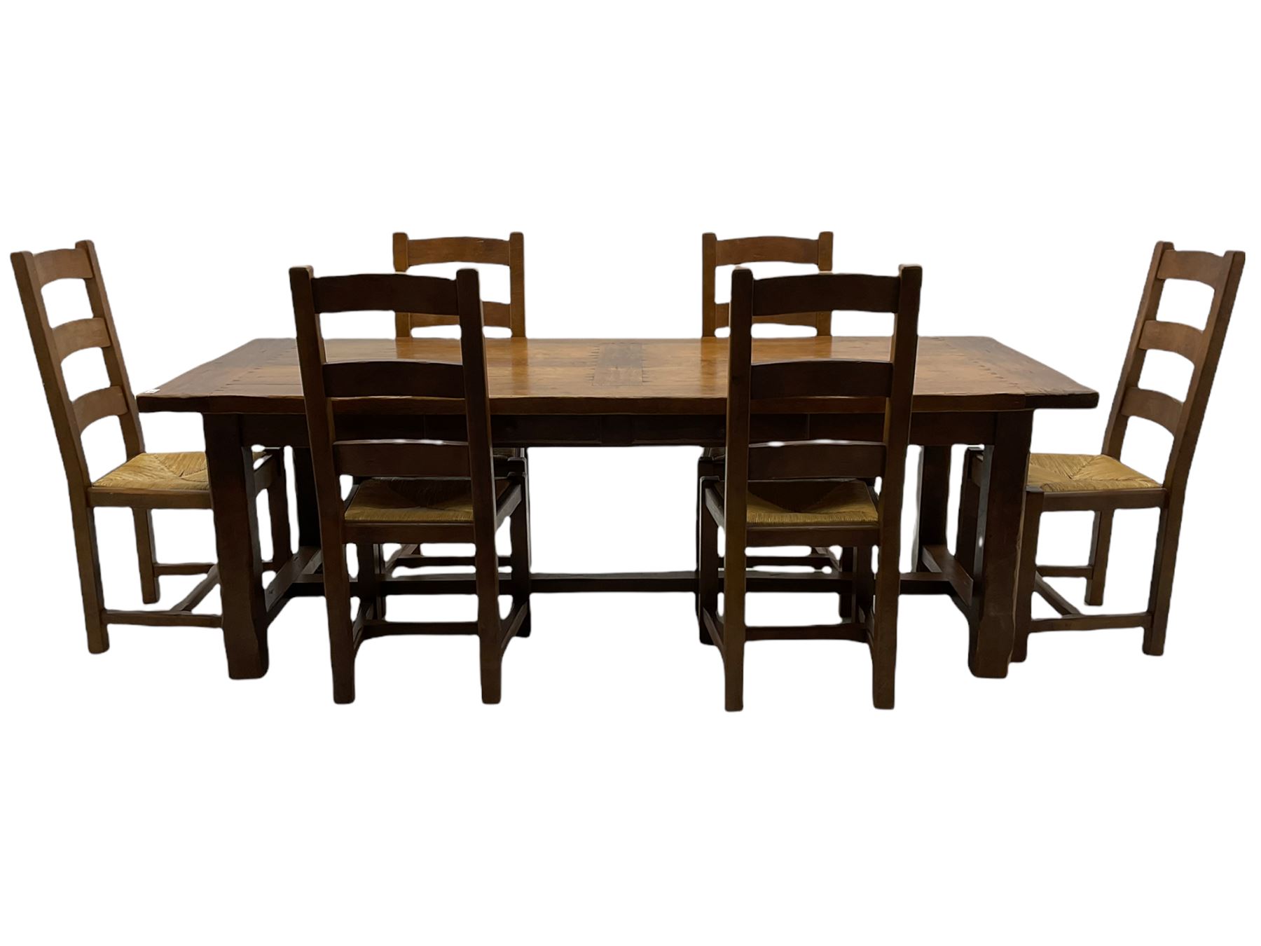 Antix French oak dining table with two leaves, two frieze drawers;, and six ladder back chairs with rush seats