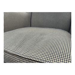 Hardwood-framed wingback armchair, upholstered in dog tooth pattern fabric, on cabriole supports 