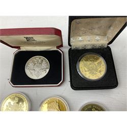 Coins including United States of America 1885 Morgan dollar, Queen Elizabeth II Bailiwick of Guernsey 20012 and 2013 five pound coins, Isle of Man Paddington Bear 2008 one crown, various other commemorative coins etc