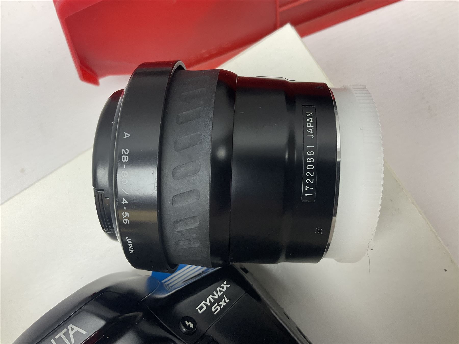 Minolta Dynax 5xi camera body serial no 17222646 with 'AF Zoom Xi 28-80mm 1:4(22)-56' lens serial no 17220881, Minolta SRT101 camera body serial 1944687, Lumix camera body serial no K6SC10168 etc 