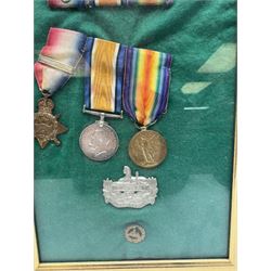 Trio of WWI medals comprising British War Medal, Victory Medal and 1914-15 Star named to '8745 Pte F. Green R. Glouch R', framed with Gloucestershire Regiment cap badge and pin, frame H34cm 
