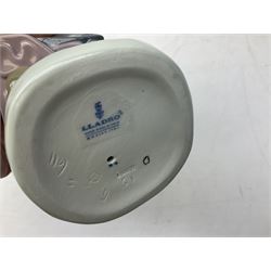 Three Lladro figures, comprising Pondering, no 5173, Nostalgia, no 5071 and Nature's Bounty, no 1417, all with original boxes, largest example H27cm