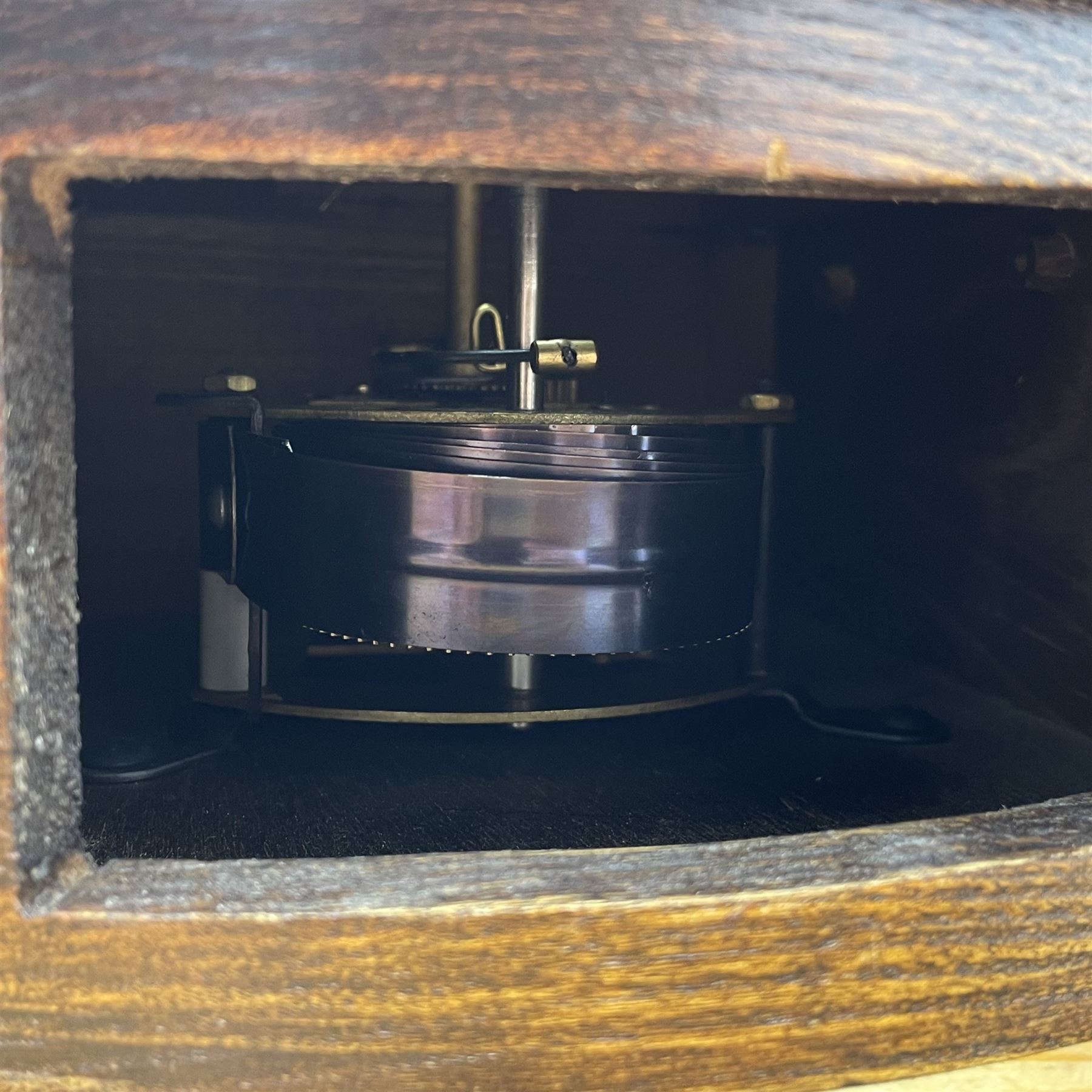 Small circular elm cased wall clock, white enamel Roman dial, single train driven movement