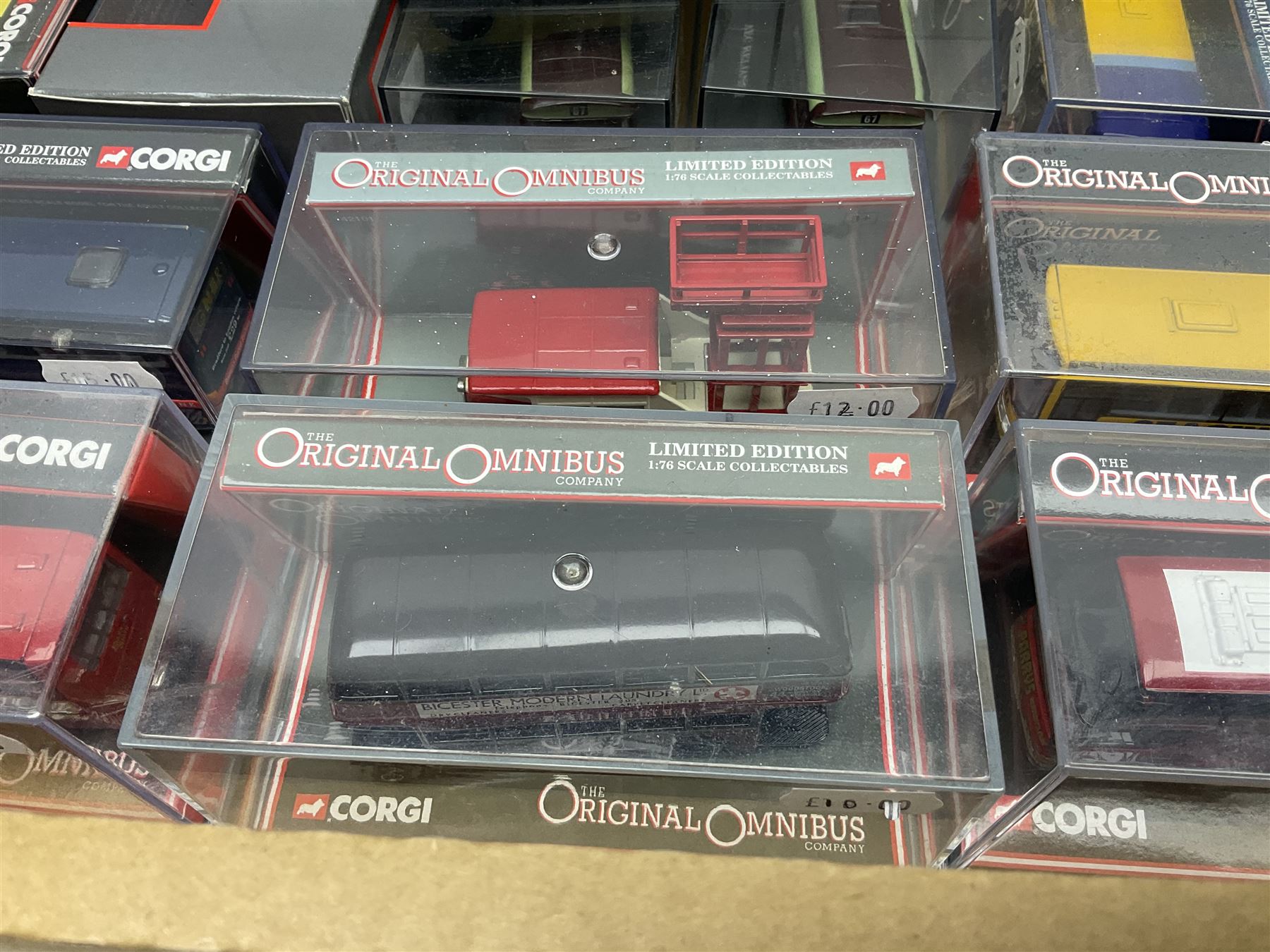 Corgi The Original Omnibus Company/Bus Operators in Britain - seventeen die-cast models of buses and coaches, predominantly limited edition; all in perspex display cases (17)