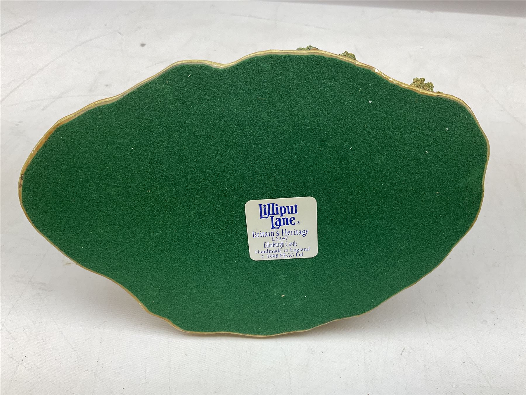 Four Lilliput Lane models from the 'Britain's Heritage' collection, comprising Edinburgh Castle, The World Famous Blacksmith's Shop Gretna Green, Shakespeare's Birthplace and Mickelgate Bar York, together with  a Lilliput Lane Beatrix Potter Hill Top model, all boxed