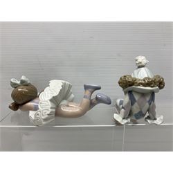 Two Lladro ledge hangers, comprising Ragamuffin no 1500 and Forgotten no 1502, together with Lladro figure Little Jester no 5203, largest example 20cm