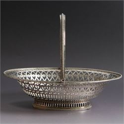George III silver bon bon basket, of oval form with bead rim and swing handle, the sides with pierced latticework decoration, hallmarked Hester Bateman, London 1785, handle H14cm
