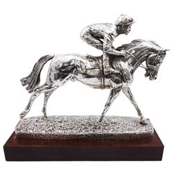 Modern silver model of a racehorse with mounted jockey, after David Geenty, hallmarked Laurence R Watson & Co, Sheffield 1998 (filled), upon a rectangular wooden base