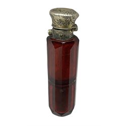 Victorian ruby cut glass scent bottle, with faceted sides, with ornately engraved silver plated cap, A/F, L10cm