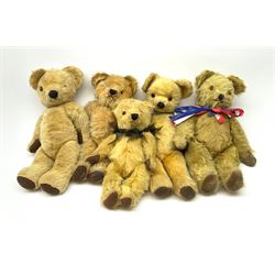 Five English teddy bears 1940s-50s including Pedigree with swivel jointed head, glass eyes, vertically stitched nose and mouth and jointed limbs with velvet paw pads H18